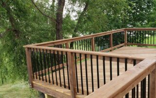 Deck with mixed material railing - creative nature